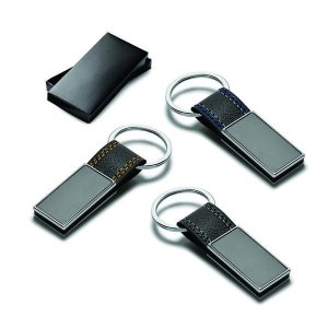 Chaveiro de metal e couro sintético brinde