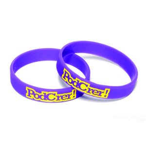 Pulseira de silicone com mensagem em baixo relevo com cor